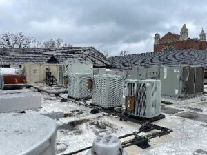 Battery of AC units on the roof of Mullin Life Center